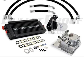 A set of parts that include an oil cooler, fuel pump and lines.