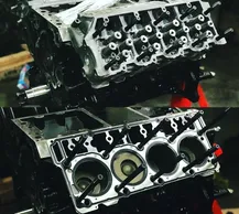 Two different views of a car engine.